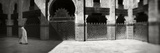 Muslim Man Walking in the Medersa  Medersa Bou Inania  Fez  Morocco