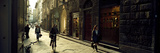 Woman Cycling in a Pedestrian Street  Florence  Tuscany  Italy