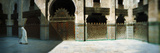 Muslim Man Walking in the Medersa  Medersa Bou Inania  Fez  Morocco