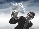 Man Touching a Cloud with Finger