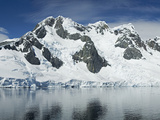 Reflection of a Snow Covered Mountain in Water  Antarctic Peninsula  Antarctica