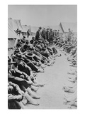 Foot Inspection  Soldiers Sit on Ground While Doctors Prepare to Examine a Full Unit at Once
