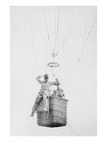Balloon Jump by a Parachutist Hanging from a Basket Suspended by it But Out of the Image