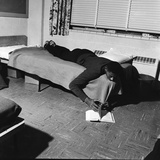 Basketball Great Wilt Chamberlain Relaxes with a Book  1957
