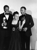 Actress Eartha Kitt poses with Sidney Portier and Raymond St Jacques at the NACCP Awards Banquet i