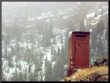 Outhouse Perches on a Hillside