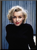 Actress Marilyn Monroe Posing at Home in Her Backyard