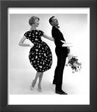 Model Wearing a Puff Ball Skirt and Escort with Roses  1958