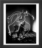 Multiple Exposure of Artist Pablo Picasso Using Flashlight to Make Light Drawing of a Figure
