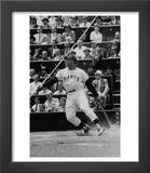 Baseball Player Willie Mays Hitting a Ball