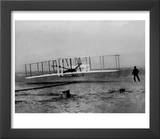 Orville Wright Taking Plane For 1st Motorized Flight as Brother Wilbur Wright Looks at Kitty Hawk