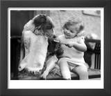 Toddler Trying to Brush Dog's Teeth