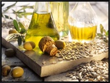 Various Oils in Carafes  Olives  Sunflower Seeds