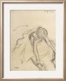 Danseuse assise  essayant ses pointes