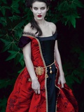 A Girl Wearing a Red Dress with Dark Makeup