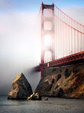 The Golden Gate Bridge Shrouded in Mist at Sunrise
