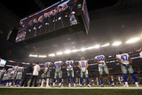 Philadelphia Eagles and Dallas Cowboys NFL: Dallas Cowboys stand during the national anthem