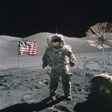 Apollo 17 Astronaut Stands Between US Flag and Lunar Rover  Dec 12  1971