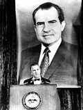 A Huge Portrait of President Nixon Dominates the Scene