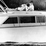 Lynda Bird Johnson Relaxes on Her Father's Cabin Cruiser with Weekend Guest  Actor George Hamilton