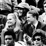 Edward and Tricia Nixon Cox Enjoy the Football Game at Harvard Stadium