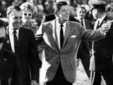 Calif Gov Ronald Reagan Escorts Pres-Elect Richard Nixon across Field at Halftime of Rose Bowl Game