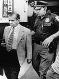 Meyer Lansky Leaves the Federal Courthouse in Miami Escorted by Government Security Guards