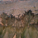 Mars Landscape Showing Flows That Appear in Spring and Summer on a Slope Inside Mars' Newton Crater