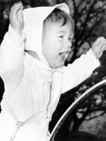 John F Kennedy Jr Stands in His Carriage on the White House Grounds  April 12  1962