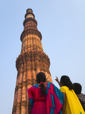 Indian Women Watching Qutb Minar and its Monuments (UNESCO World Heritage Site)  Delhi  India