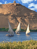 Felucca Sailboats  Temple Ruins and the Large Sand Dunes of the Sahara Desert  Aswan  Egypt