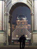 A Couple Beneath the Arc De Triomphe Du Carrousel at the Louvre  Paris  France