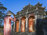 Girl in Ao Dai (Traditional Vietnamese Long Dress) and Conical Hat at Minh Mang Tomb  Vietnam