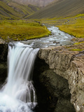 Water Running from Glacier and Waterfall  Iceland