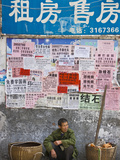 Man by Wall with Posters  Guilin  Guangxi  China