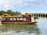 The Summer Palace  Traditional Dragon Boat and Seventeen Arch Bridge  Kunming Lake  Beijing  China