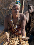 Local Woman Dancing with Gourd Rattle  Kxoe Village  Kwando River Area  Eastern Namibia