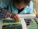 Woman Silk Embroidering at Naxi Hand-Made Embroidery Institute  Baisha Village  Lijiang  China