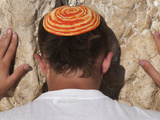 Close Up of Young Man with Bright Yarmulka Praying at Western Wall  Old City  Jerusalem  Israel