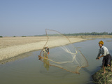 Youngster Fishing with Fishing Net in a Waterway  Irrawaddy Delta  Myanmar (Burma)  Asia
