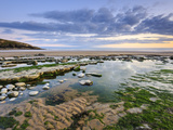 Sunset over Rocks and Pools at Dunraven Bay  Southerndown  Wales