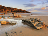 Sunset over Rocks with Flowing Water at Dunraven Bay  Southerndown  Wales