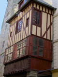 Medieval Corbelled and Half Timbered Mansions in Cobbled Street  Old Town  Dinan  Brittany  France