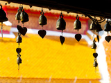 Close Up of Prayer Bells Silhouetted Against Colourful Roof at Wat Doi Suthep  Chiang Mai  Thailand