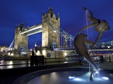 Girl with Dolphin by David Wynne  Illuminated at Night in Front of Tower Bridge  London  England