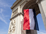 French Flag under Arc de Triomphe Built by Napoleon  Paris  France  Europe