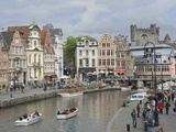 Everyday Scene Along Graslei Bank  Gravensteen Castle Beyond  in Centre of Ghent  Belgium