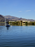 Aymara Man in Boat  Lake Titicaca  Flotantes  Peru  Peruviann  Latin America  South America