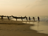 Fishermen Hauling in Nets at Sunrise  Chowara Beach  Near Kovalam  Kerala  India  Asia