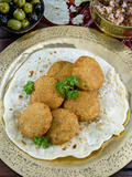 Falafel  Deep-Fried Balls or Patties Made from Ground Chickpeas and or Fava Beans  Arabic Countries